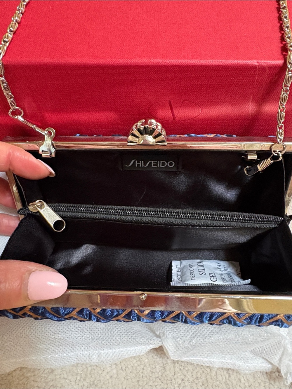 Shiseido Blue Woven Clutch with Gold-Tone Frame and Chain